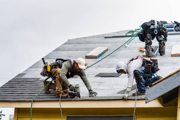 Professional Roofing technician working in Lewiston, ME
